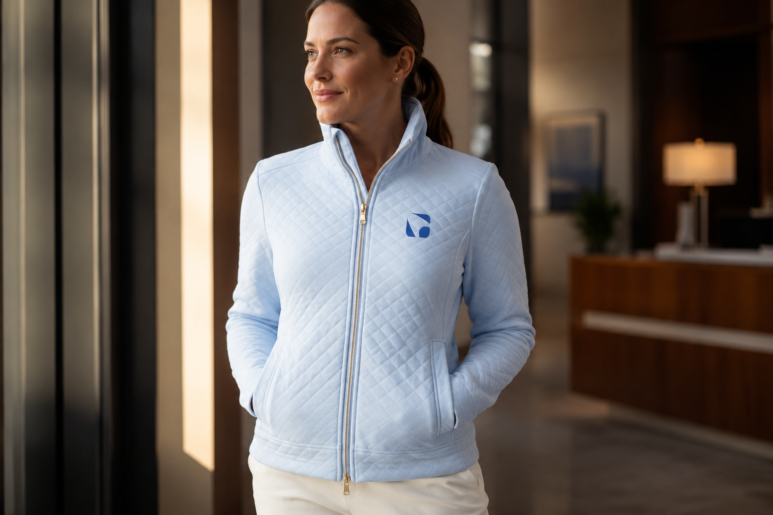 Branded internal apparel systems for corporate teams — custom polos, quarter-zips, and workwear by Merch Club