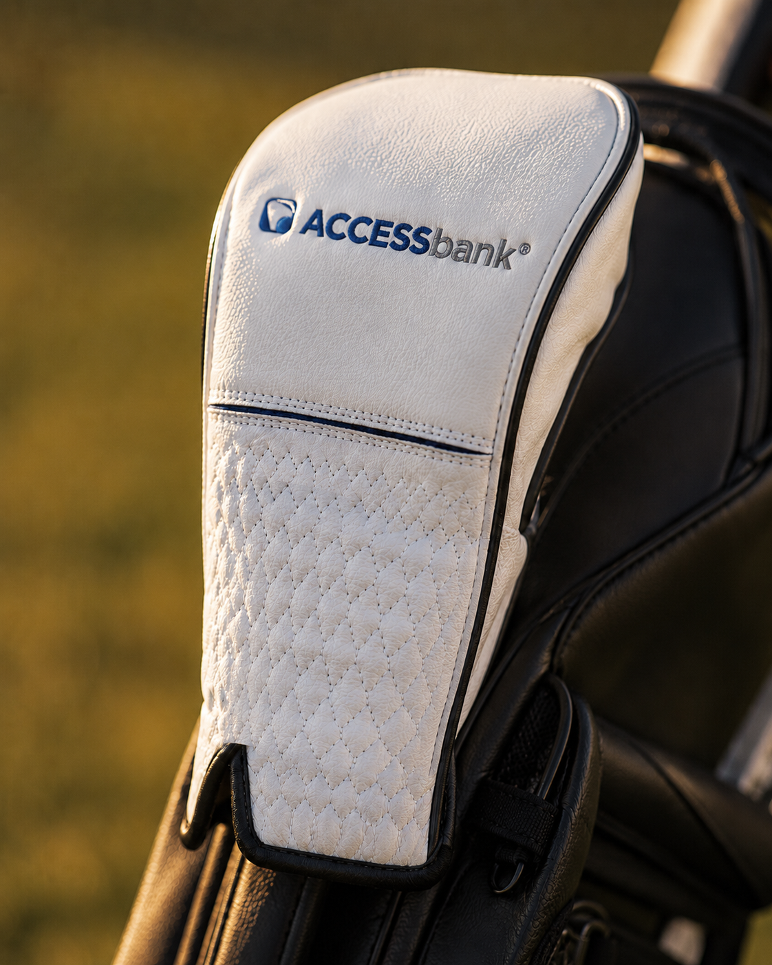 ACCESSbank-branded Igloo backpack cooler on the golf course at sunrise