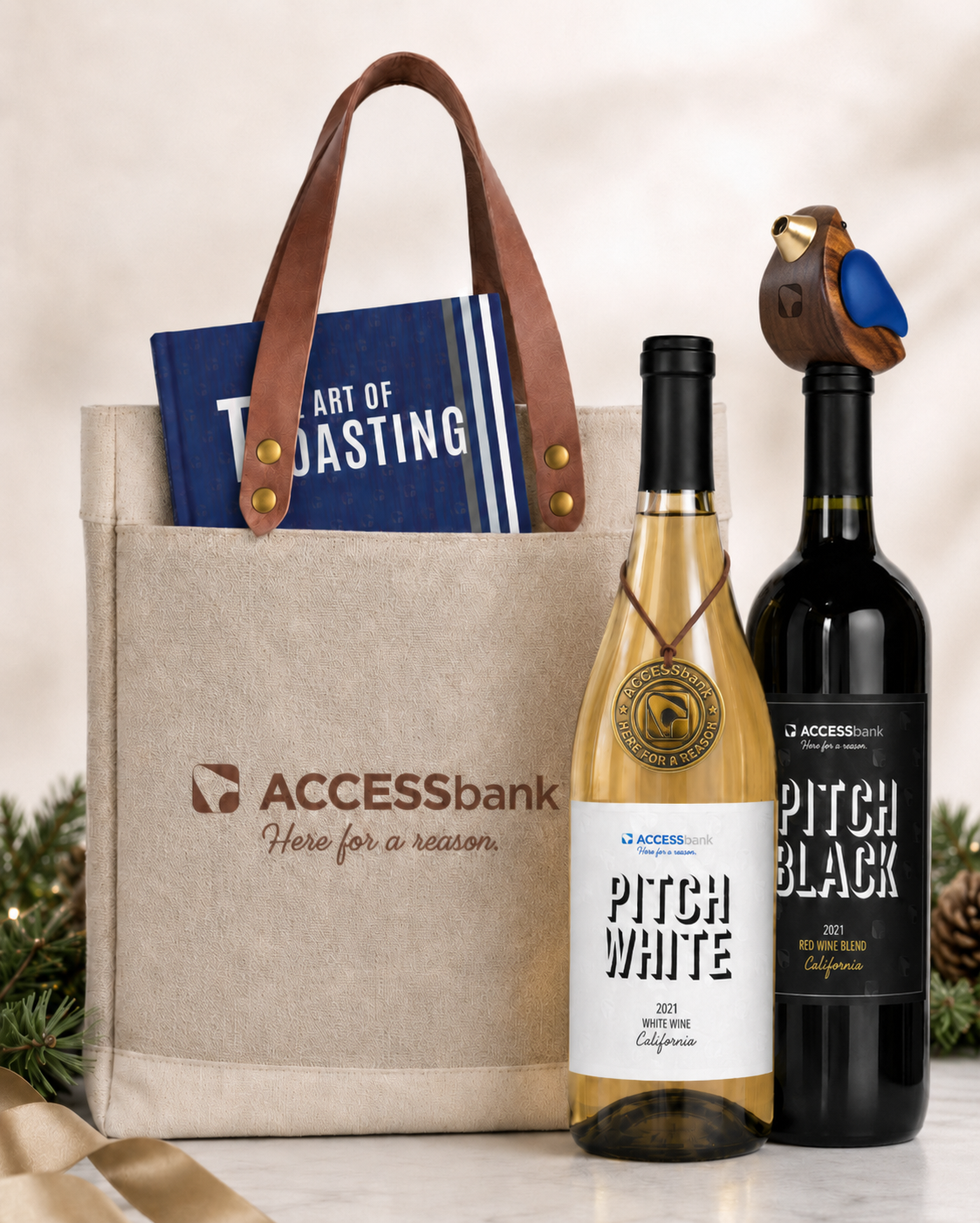 ACCESSbank x PITCH gift tote with Pitch White and Pitch Black wines and the Art of Toasting book